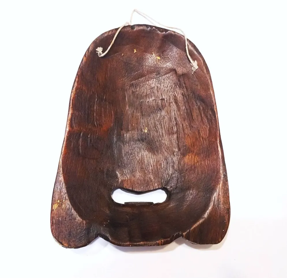 Ancien masque en bois de Boudha