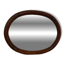 Ancien miroir ovale biseauté cadre en bois et décors bronze style Louis XVI