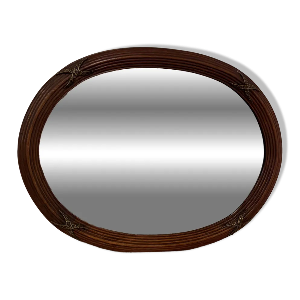 Ancien miroir ovale biseauté cadre en bois et décors bronze style Louis XVI