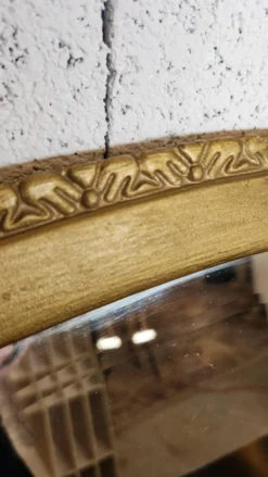 Ancien miroir ovale à parclose dorée ,c verre biseauté