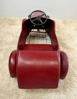 Ancienne voiture à pédales pour enfant en tôle rouge – années 1930