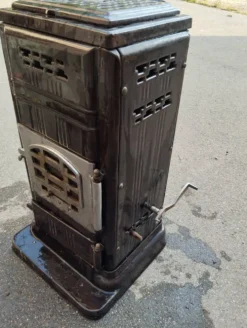 Ancien poêle en fonte émaillée ciney