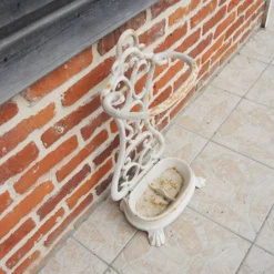 Ancien porte-parapluie en fonte émaillée blanche