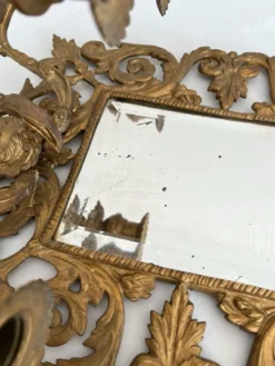 Applique miroir biseauté en bronze doré 3 bougeoirs