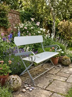 Banc de jardin ancien en fer forgé massif