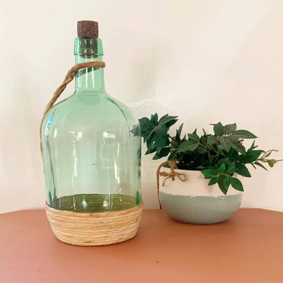 Bonbonne vintage en verre et raphia