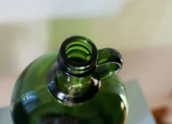 Bonbonne vintage en verre vert