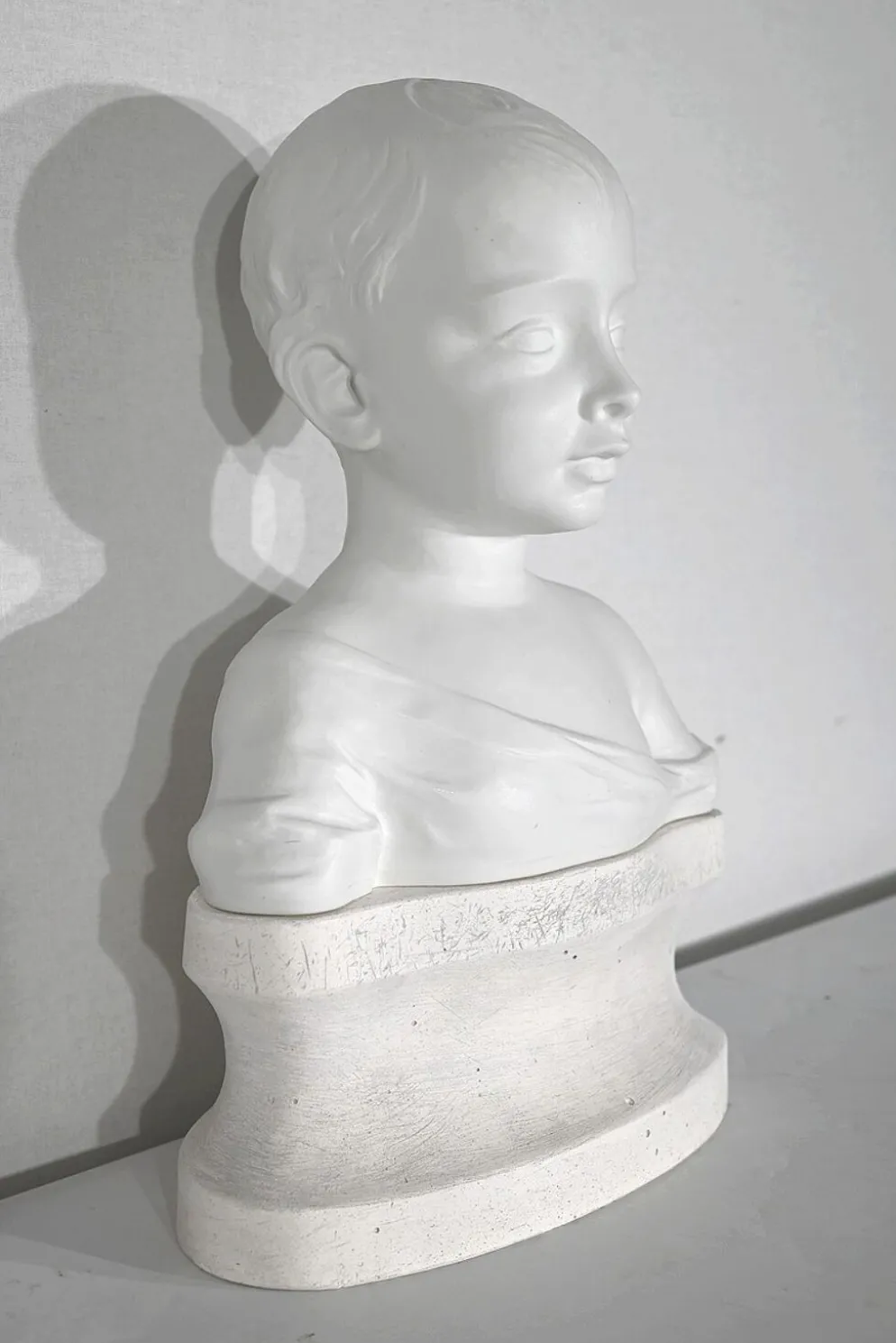 Buste d’enfant en biscuit de limoges – début xxe