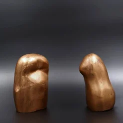 Bustes d'homme et de femme en bronze