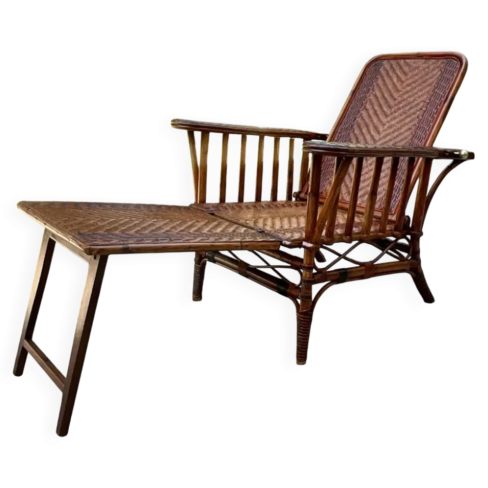 Chaise longue ancienne en rotin tressé avec repose-pieds