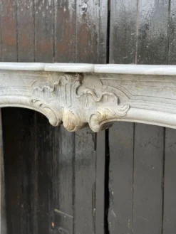 Cheminée Louis XV en marbre bleu turquin, XVIIIeme siècle