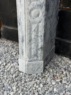 Cheminée modèle Pompadour en marbre bleu turquin vers 1880, une paire disponible