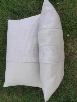 Coussin à bandes raphia de nobilis