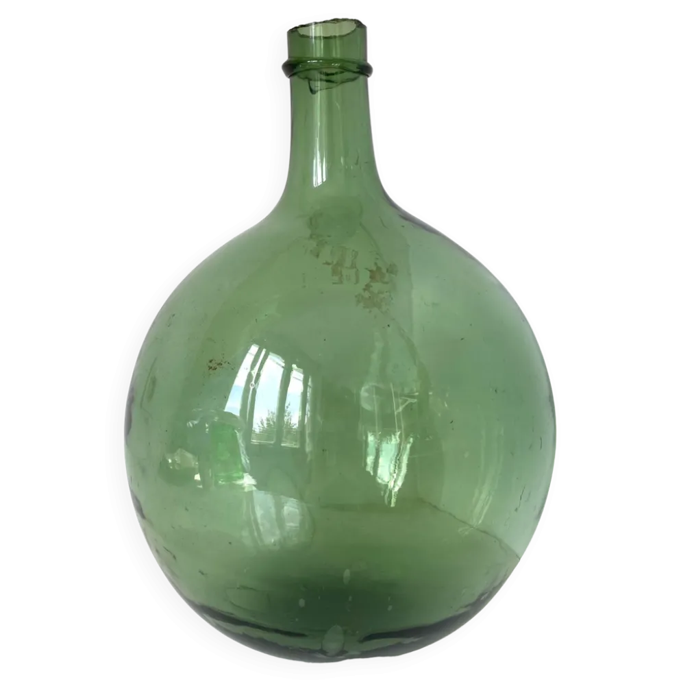 Dame Jeanne ancienne en verre vert à col bagué et ouverture martelée