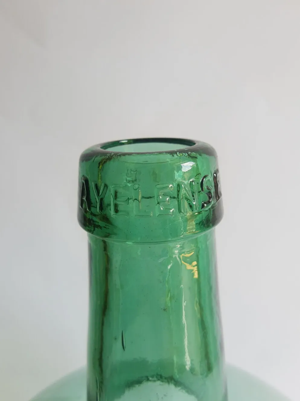 Dame jeanne bonbonne en verre verte Ayelense vintage