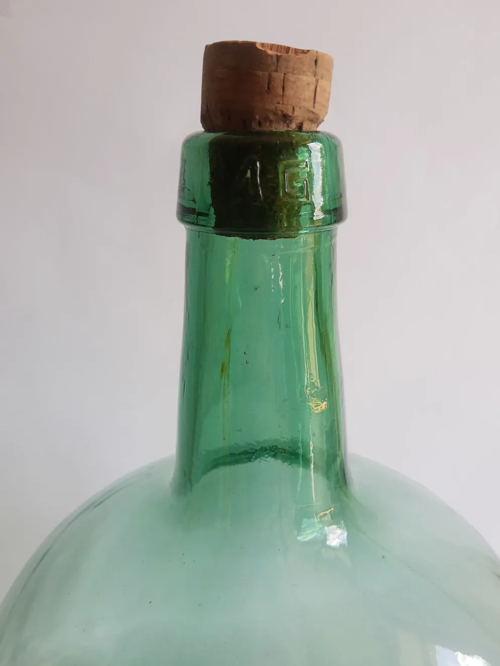 Dame jeanne bonbonne en verre verte Ayelense vintage