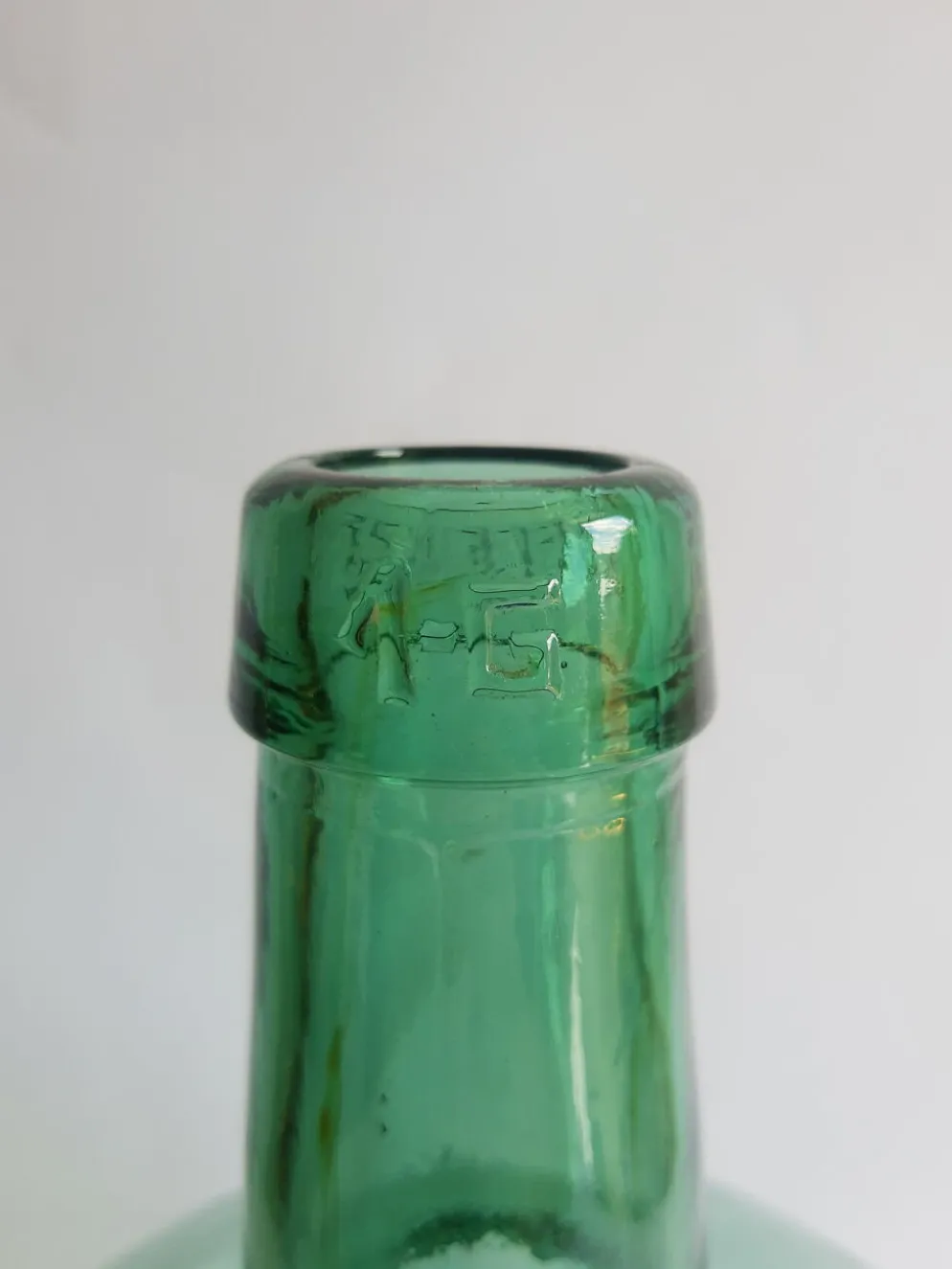 Dame jeanne bonbonne en verre verte Ayelense vintage