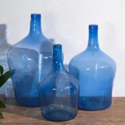 3 dame-Jeanne en verre bleu, vers 1920
