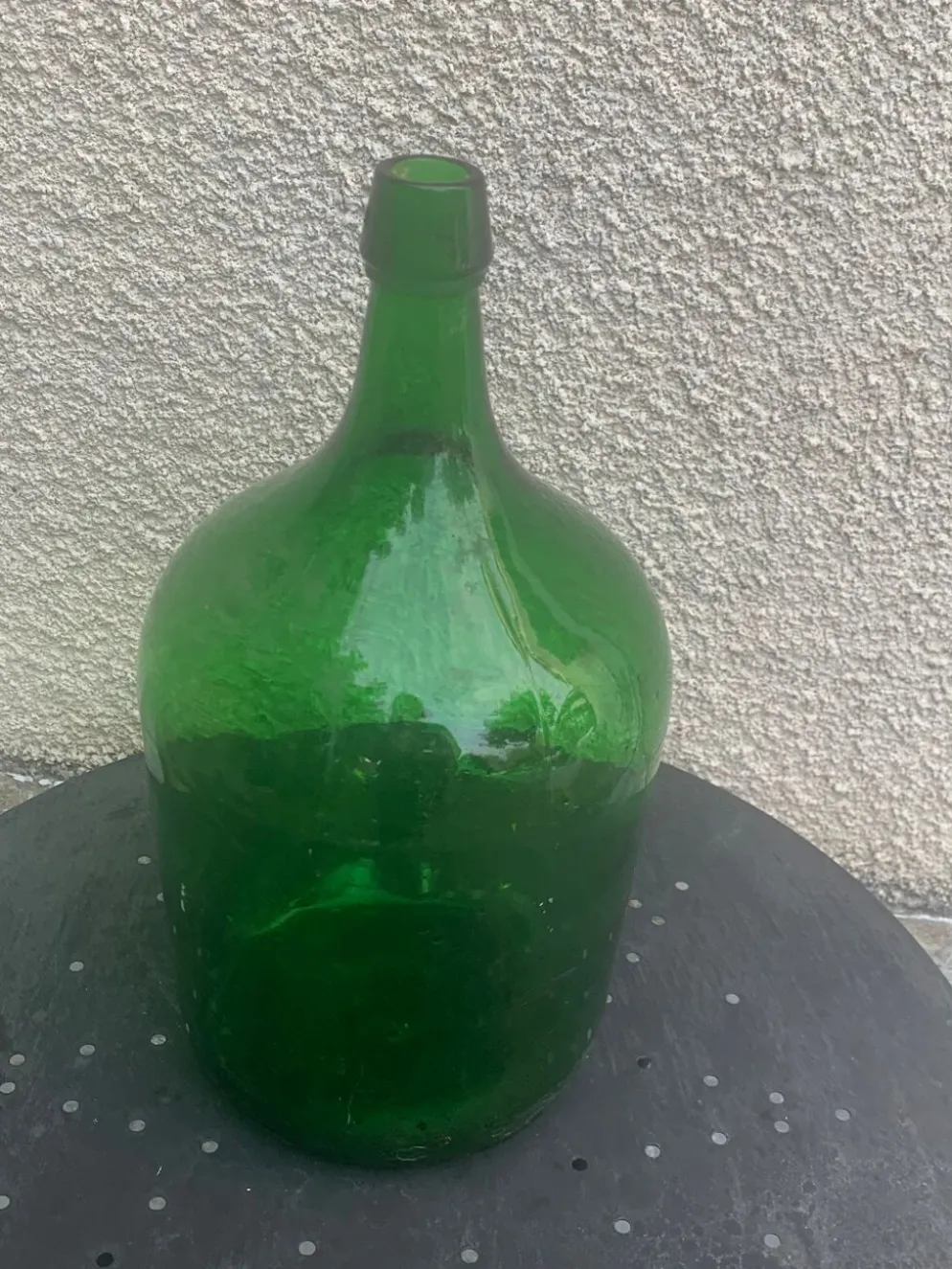 Dame jeanne en verre verte vintage