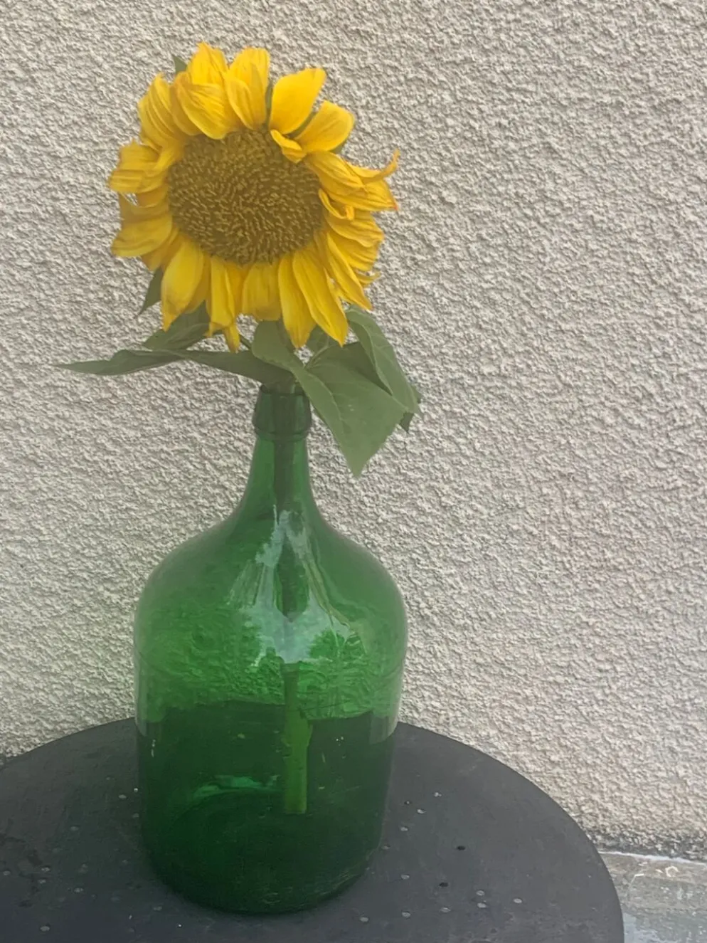 Dame jeanne en verre verte vintage