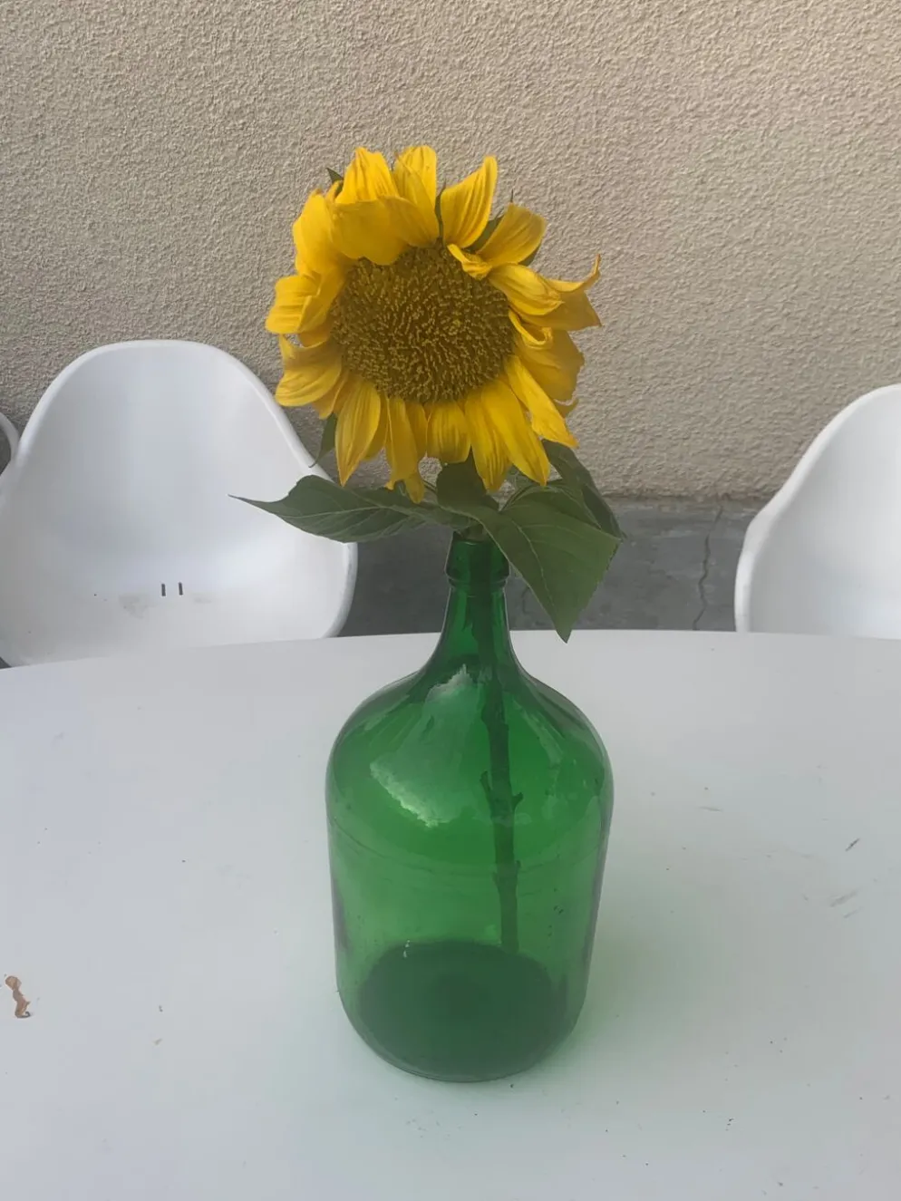 Dame jeanne en verre verte vintage