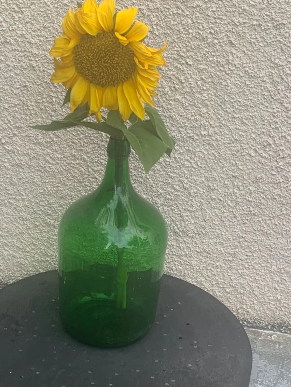 Dame jeanne en verre verte vintage