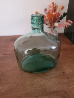 Dame-jeanne en verre vert oblongue