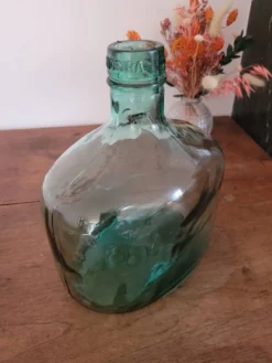 Dame-jeanne en verre vert oblongue