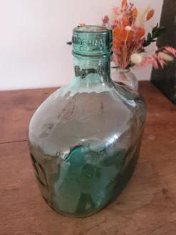 Dame-jeanne en verre vert oblongue