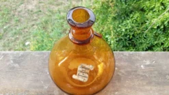 Dame Jeanne ou bonbonne verre soufflé ambré