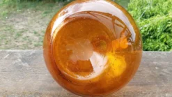 Dame Jeanne ou bonbonne verre soufflé ambré
