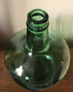 Dame jeanne Viresa Bonbonne en verre vert foncé