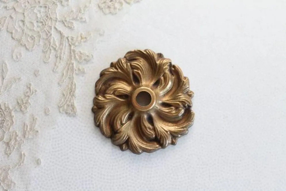 1 décor, cache en bronze