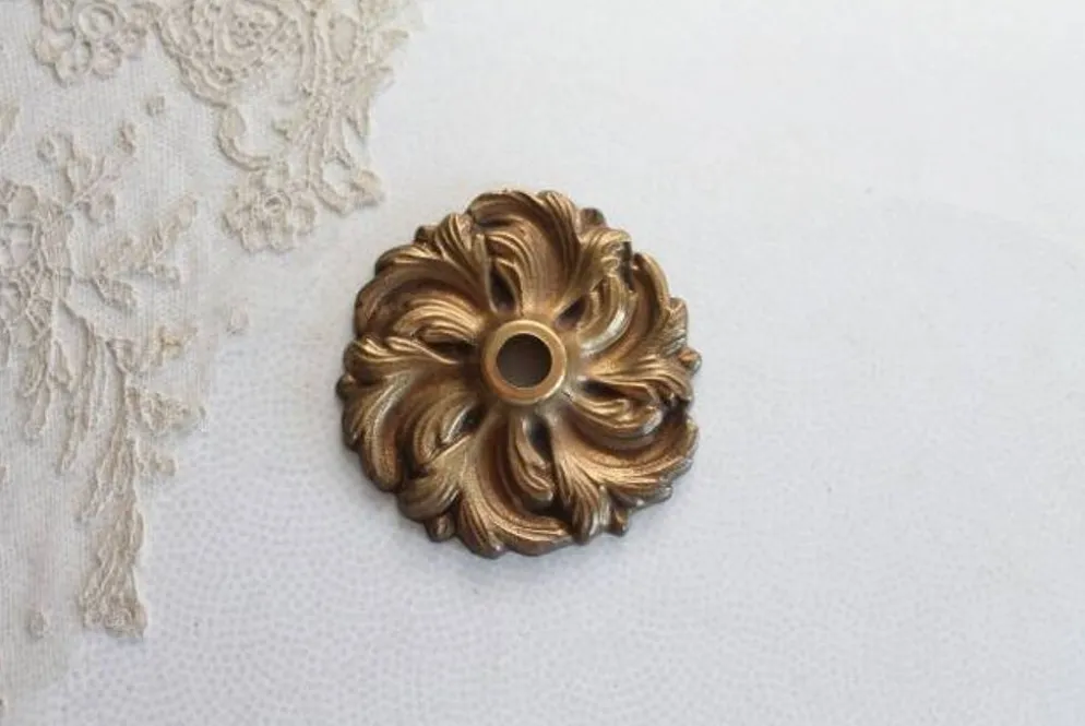 1 décor, cache en bronze