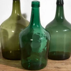 Demijohns verts anciens (c.1920). Ensemble de 3 pièces
