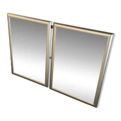 Deux Miroirs biseautés avec encadrement en finition effet or blanc vieilli
