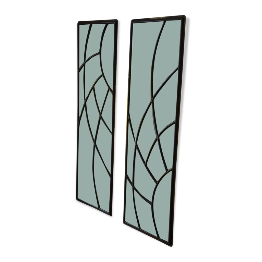 Deux vitraux en verre biseauté et laiton