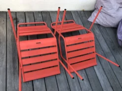 2 fauteuils bas Fermob modèle Monceau couleur capucine