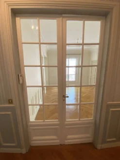 Grande double porte haussmannienne vitrée, Paris fin XIXe siècle