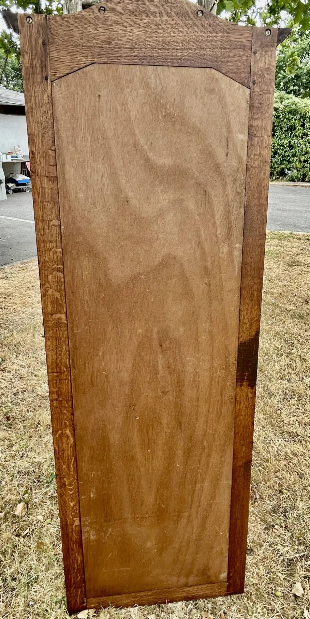 Grand et ancien miroir de pied chantourné biseauté
