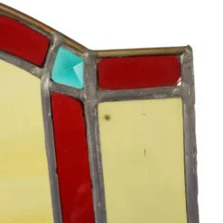 Grand médaillon en vitrail coloré