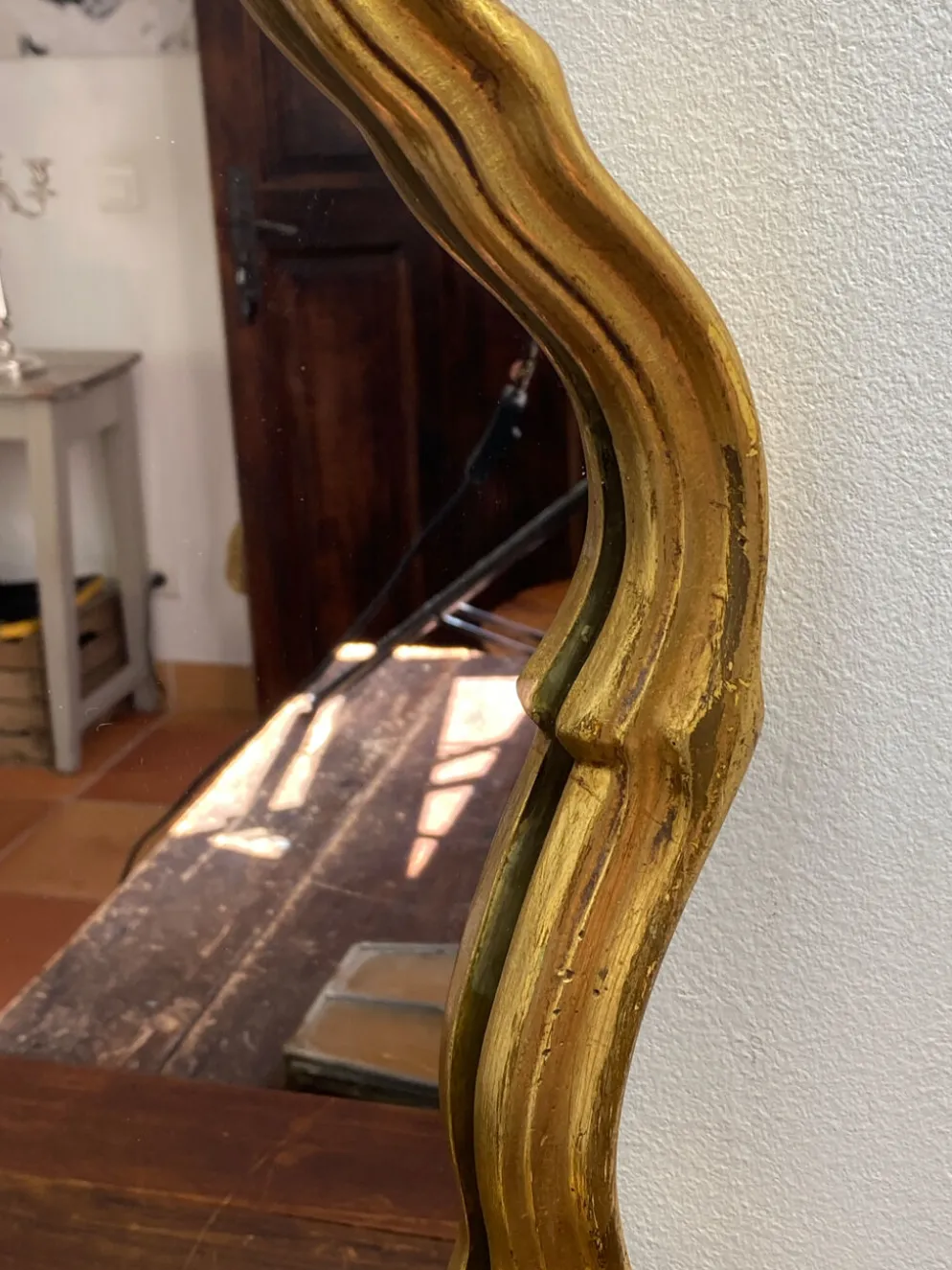Grand miroir baroque en bois doré