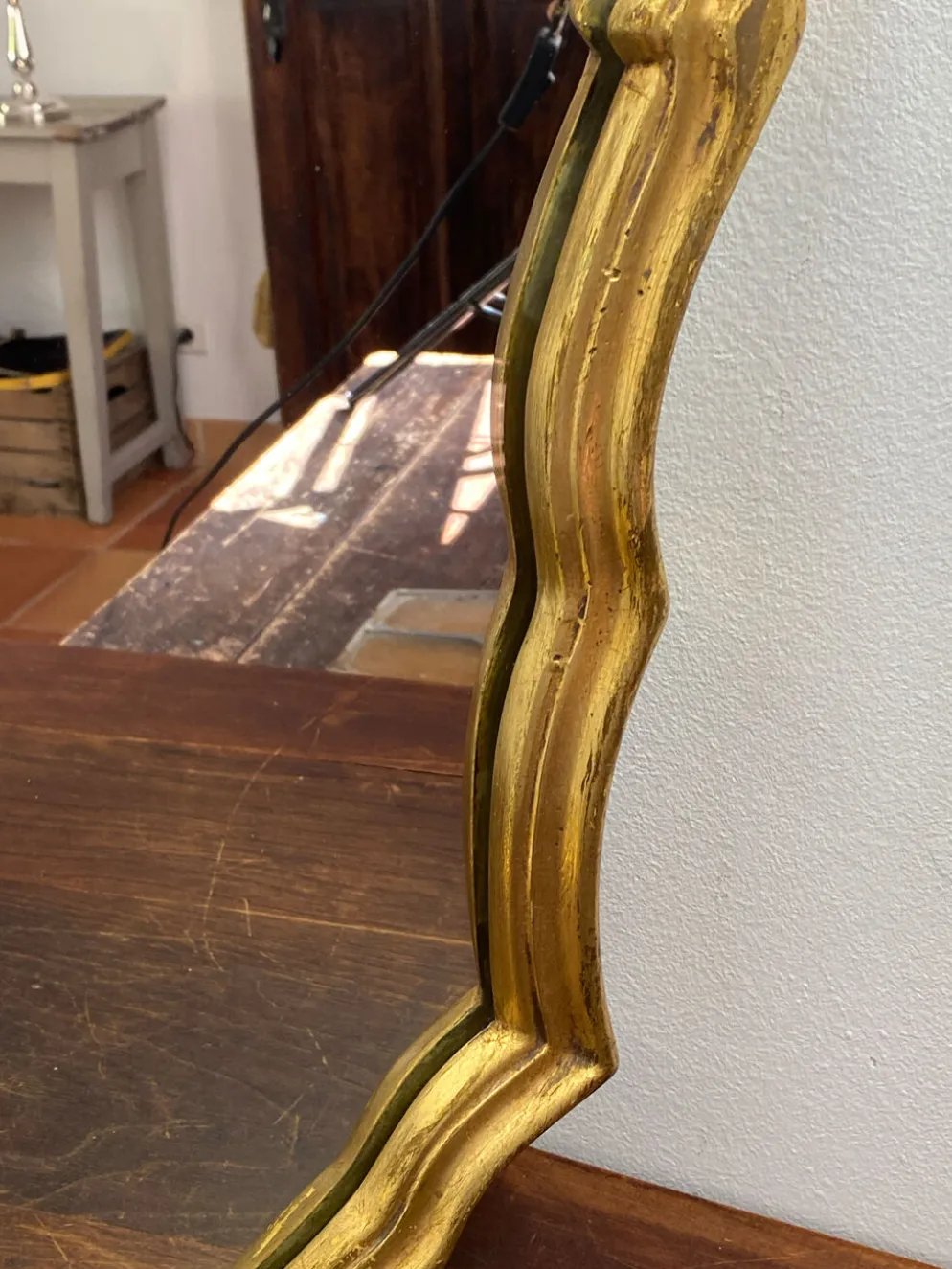 Grand miroir baroque en bois doré