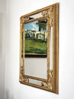 Grand miroir italien doré en bois à verre biseauté
