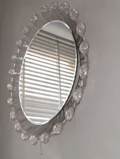 Grand miroir mural biseauté circulaire éclairé en lucite de glace fondue, années 1970
