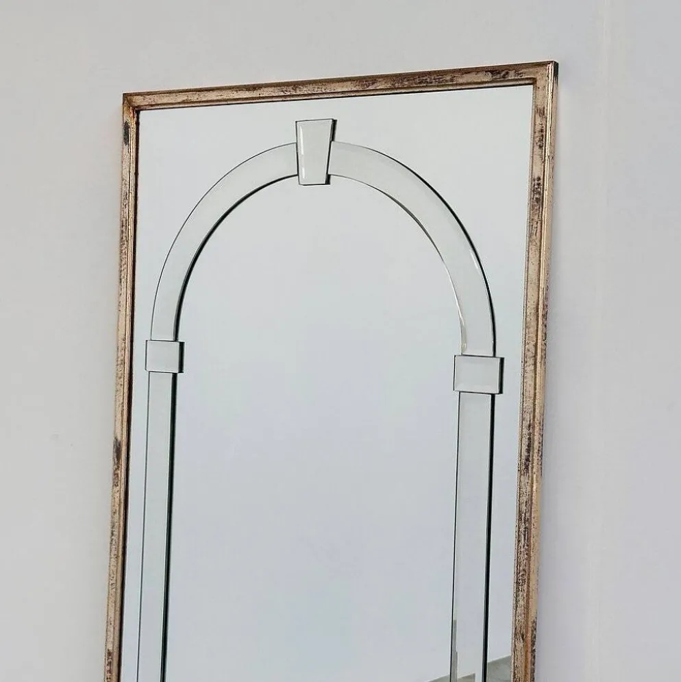 Grand miroir mural en verre biseauté de style Art Déco avec design d'arc architectural.