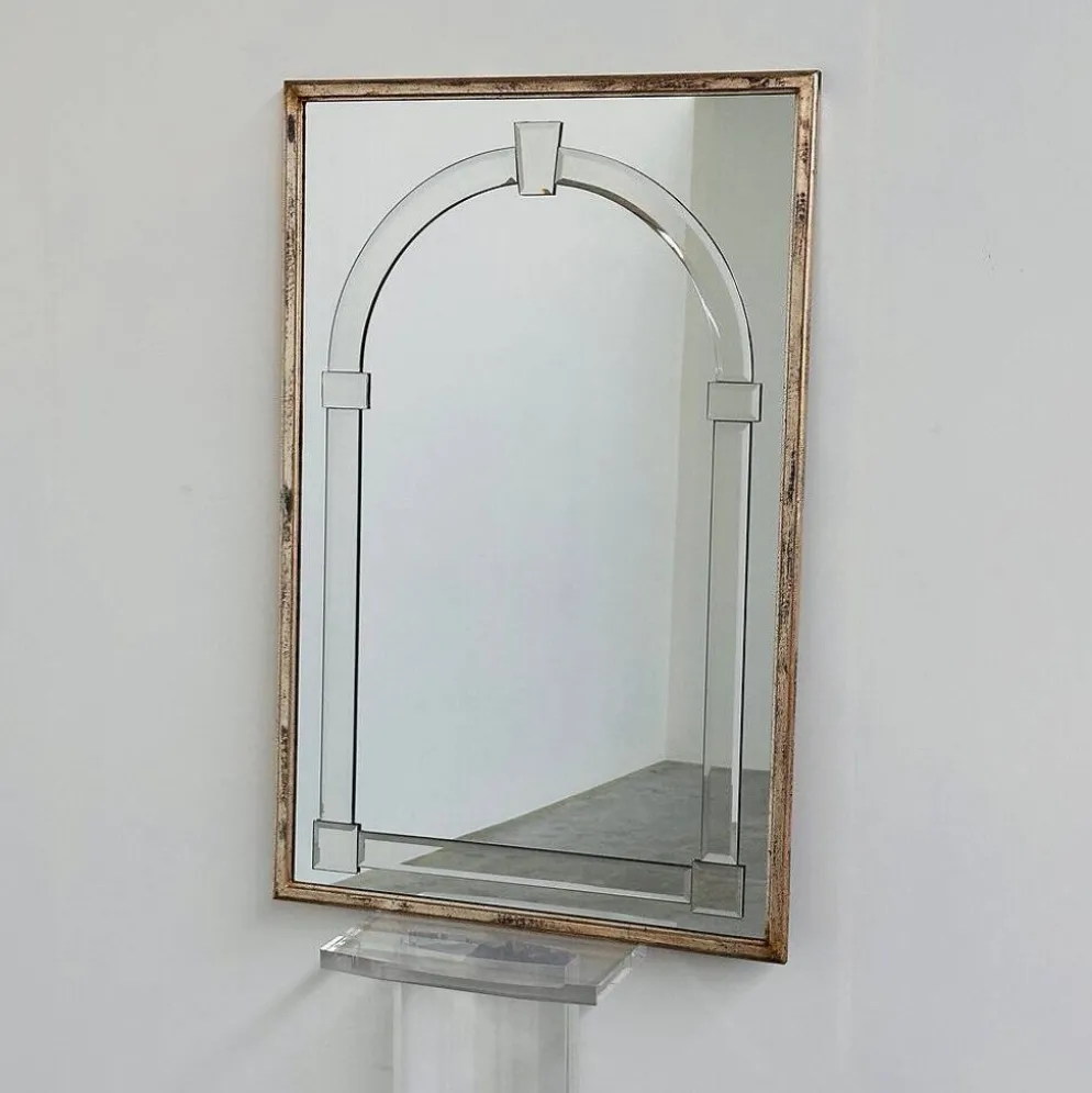 Grand miroir mural en verre biseauté de style Art Déco avec design d'arc architectural.