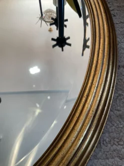 Grand miroir Ovale Deknudt en bois doré années 70
