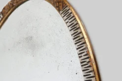 Grand miroir ovale en art déco doré et argenté, vers 1910