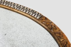 Grand miroir ovale en art déco doré et argenté, vers 1910